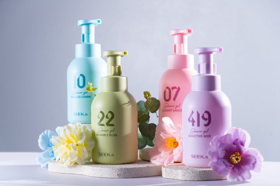 A vibrant display of shower gel bottles and flowers for an appealing product shot.