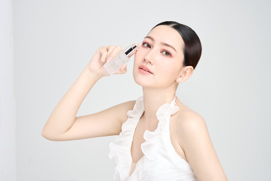 Serene model holding skincare product in modern beauty photoshoot.